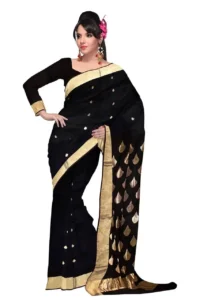 Elegant black and gold sari with intricate gold thread work.