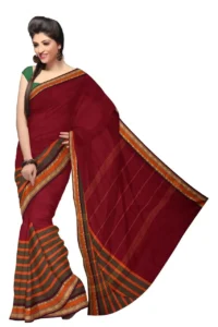 Maroon cotton saree with a stylish striped border, perfect for a traditional yet trendy look.